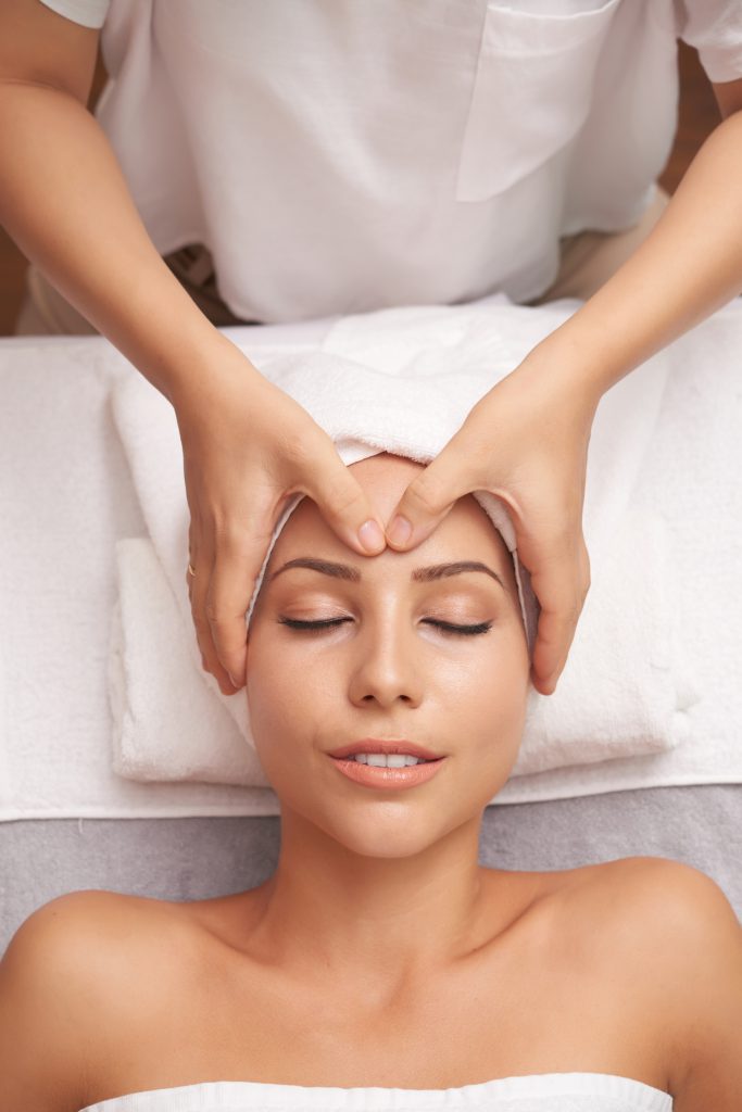 young caucasian woman having spa procedures